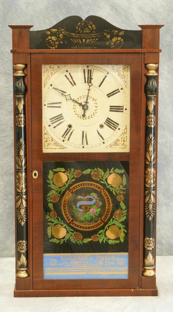 Boardman and Wells, Bristol, Conn., 30-hour wood m: Boardman and Wells, Bristol, Conn., 30-hour wood movement time/strike half-column and splat shelf clock, stenciled columns and crest board, signed in the reverse painted panel, 31 1/2" high