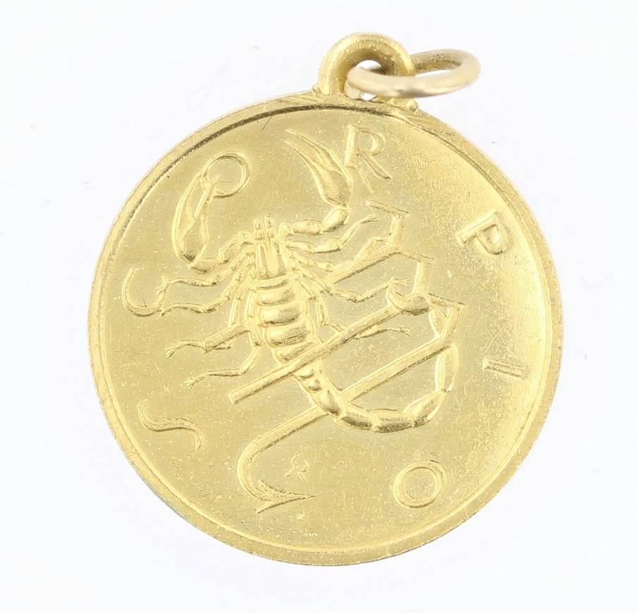 18K YG Scorpio Medal Pendant: 18K YG Scorpio medal pendant, 2.4 dwts, 19.3 diam.