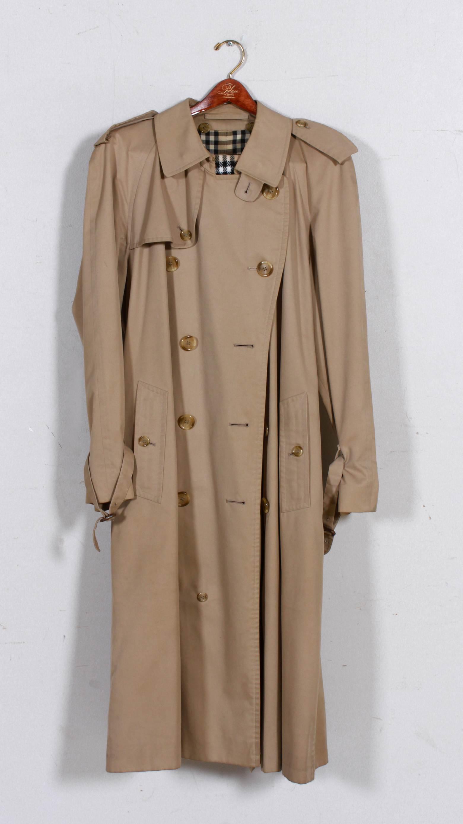 Vintage Burberry's Trench and Scarf: Vintage Burberry's trench and scarf to include double breasted signature trench, plaid lined, 40" bust, some wear, some pulls to scarf.