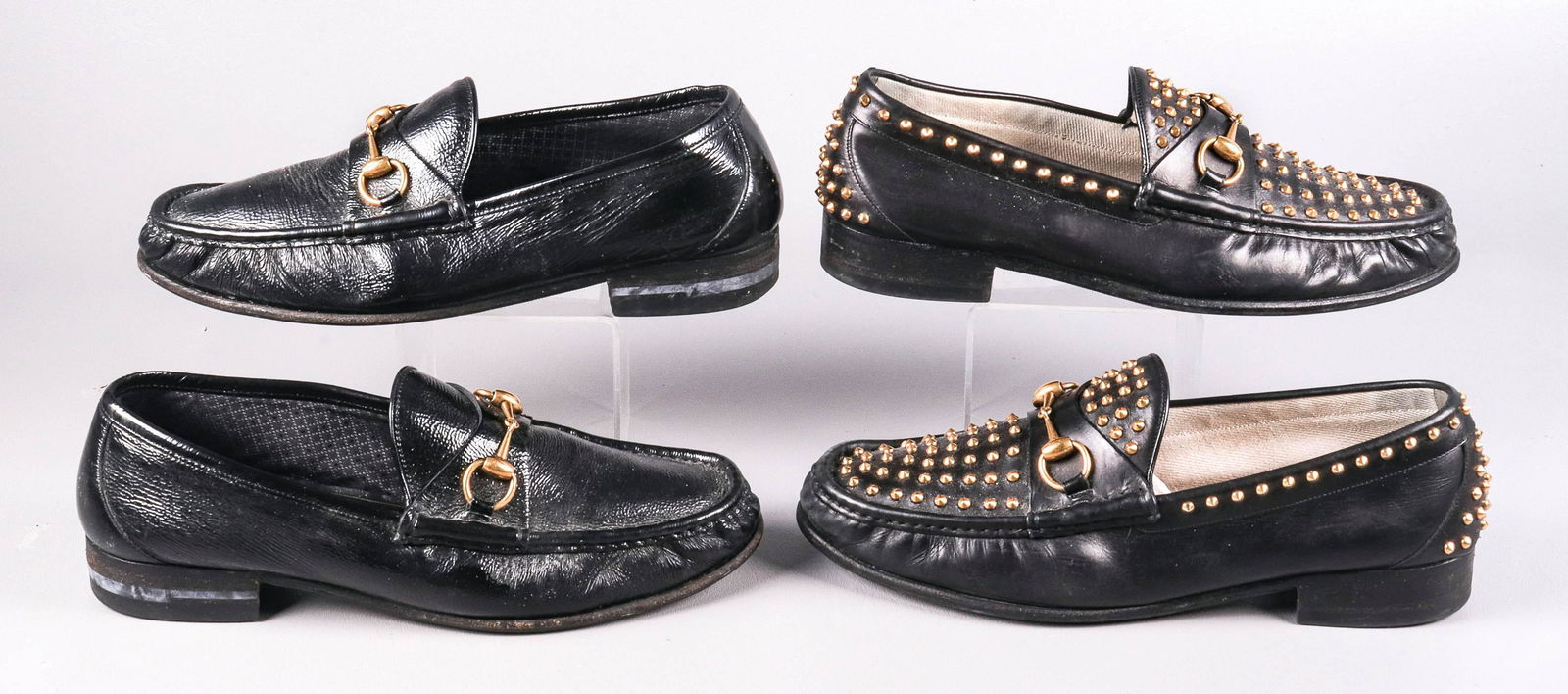 (2) Pair Gucci 1953 Collection Horsebit Loafers: (2) Pair Gucci 1953 collection horsebit loafers to include black leather loafers in brushed gold tone stud and horsebit adornment and black patent leather brushed gold horsebit loafers, 11.5 , mens si