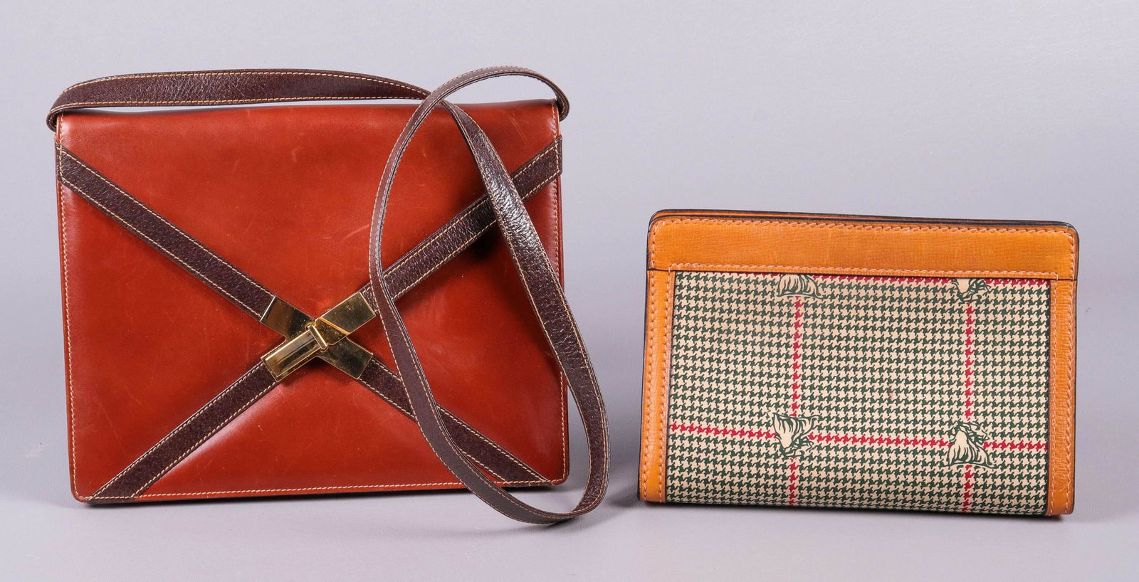 (2) Vintage Mark Cross Purse and Clutch: (2) Vintage Mark Cross purse and clutch to include all leather envelope convertible clutch with gold tone buckle hardware, pebbled leather trim and contrast stitching, 10-3/4" L x 8-1/2" H, 15-1/2" st