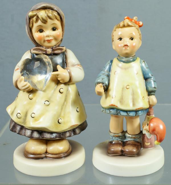 2 Hummel figurines: A Heartfelt Gift - 856, 5 1/4": 2 Hummel figurines: A Heartfelt Gift - 856, 5 1/4" tall; Fascination - 649/0, 4 5/8" tall, modern marks, all have original boxes, no damage, 4 digit security code etched on bottom