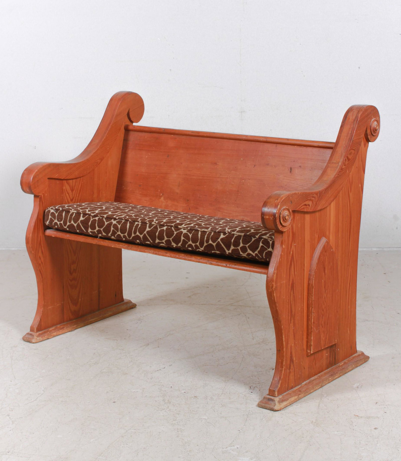 Pine scrolled church pew: Pine scrolled church pew, upholstered cushion, 38"h x 48"w x 28"d