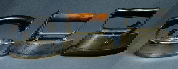 (3) Irons with removable wooden handles, 2 double p: (3) Irons with removable wooden handles, 2 double pointed, Sensible No 80 Asbestos line patented May 5 1908, Dover sad iron No 62, and an Asbestos sad iron patented May 22, 1900, longest 7"