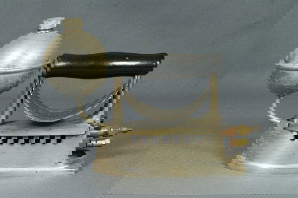 Alcohol powered iron by The Ideal Sad Iron Mfg Co,: Alcohol powered iron by The Ideal Sad Iron Mfg Co, pat Mar 5 01, Cleveland, O, 10" l