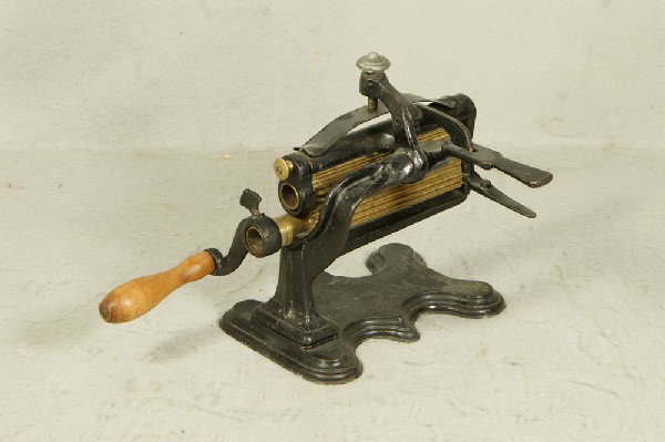 Fluting machine, double brass rollers, stenciled C: Fluting machine, double brass rollers, stenciled Crown Jewel, Lowerre and Tucker, Newark, NJ, Nov 23, 1869, 7 3/4" l, 5 1/4" w