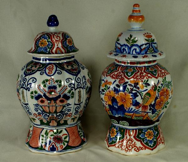 2 assorted Dutch faience polychrome covered jars, a: 2 assorted Dutch faience polychrome covered jars, approx 12" h, 19th/20th c, on lid a possible marriage