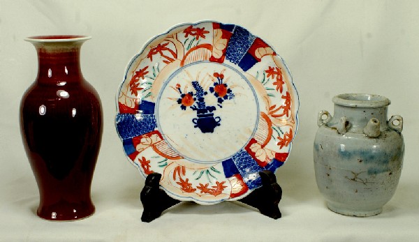 3 Asian ceramics c/o a Japanese Imari plate, 8 1/4: 3 Asian ceramics c/o a Japanese Imari plate, 8 1/4" dia, early Chinese blue and white wine pot, approx 5 1/2" h, and a 20th c Sang De Boeuf vase, 8" h