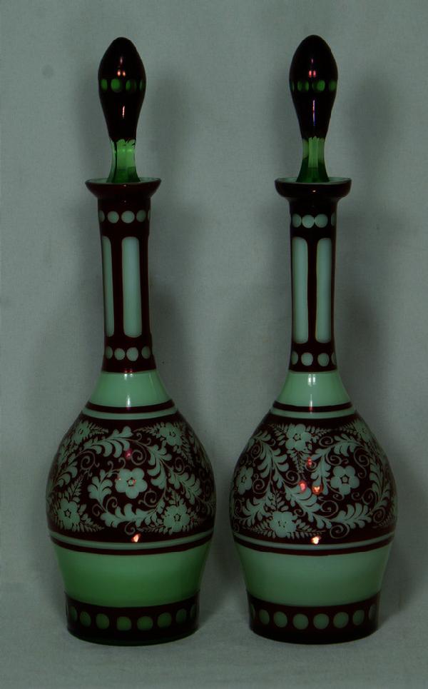 Pair of Bohemian overlay ruby to pale green decan: Pair of Bohemian overlay ruby to pale green decanters, 19th c, approx 14" h