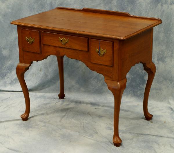 Walnut Queen Anne style lowboy by Marshall Brinto: Walnut Queen Anne style lowboy by Marshall Brinton, West Chester, 1980, made from King Ranch walnut, 31" w