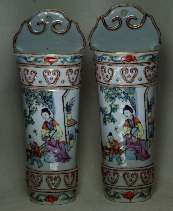 2 pcs of Chinese porcelain, a pr of wall pockets : 2 pcs of Chinese porcelain, a pr of wall pockets with a maiden and young boy, James Galley label to base of both, approx 10 3/4" h, c 1880