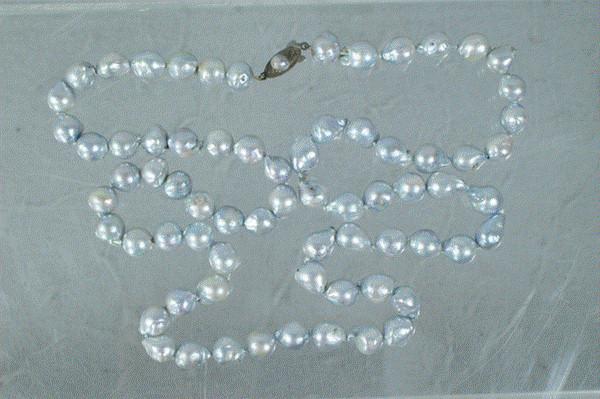 30" single strand black 8-10 mm baroque Tahitian : 30" single strand black 8-10 mm baroque Tahitian pearls, catch marked "silver"