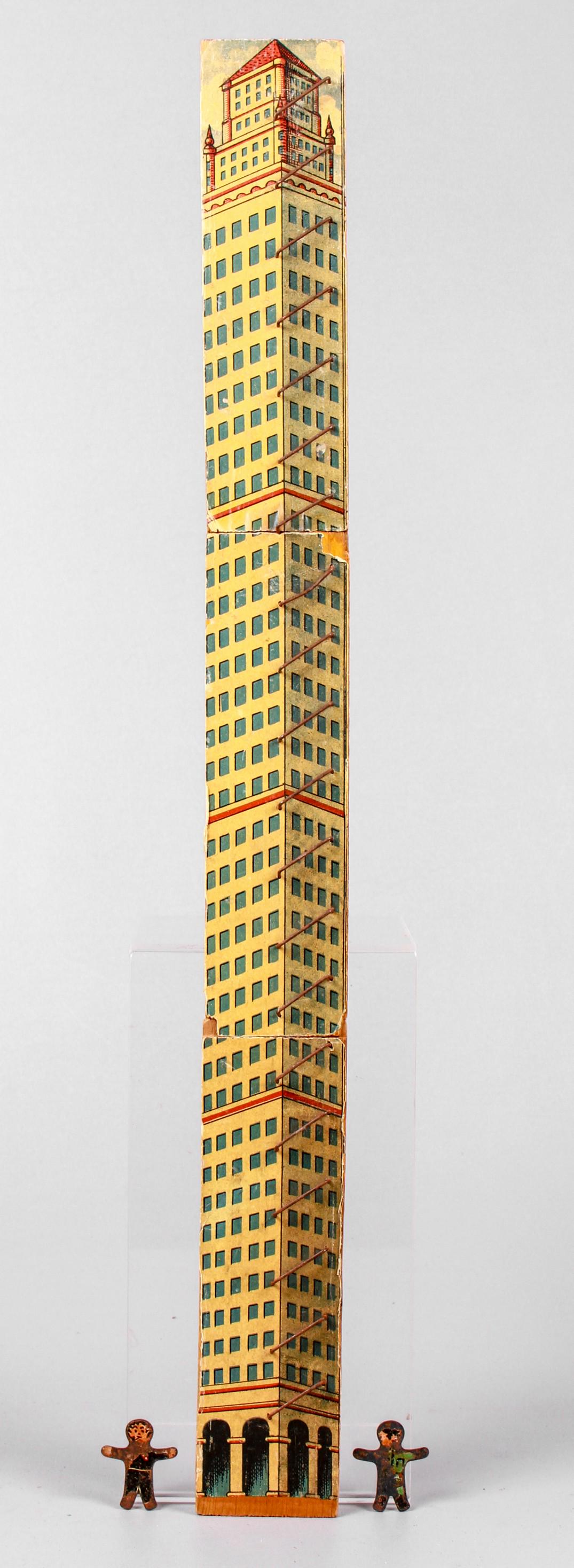 Wood Jointed Paper Litho Skyscraper with Climbers: Wood jointed paper litho skyscraper with climbers, wood base with 3-joint paper litho skyscraper decorated tower with metal rungs, includes (2) metal men that 'climb' downward when dropped from top, 2