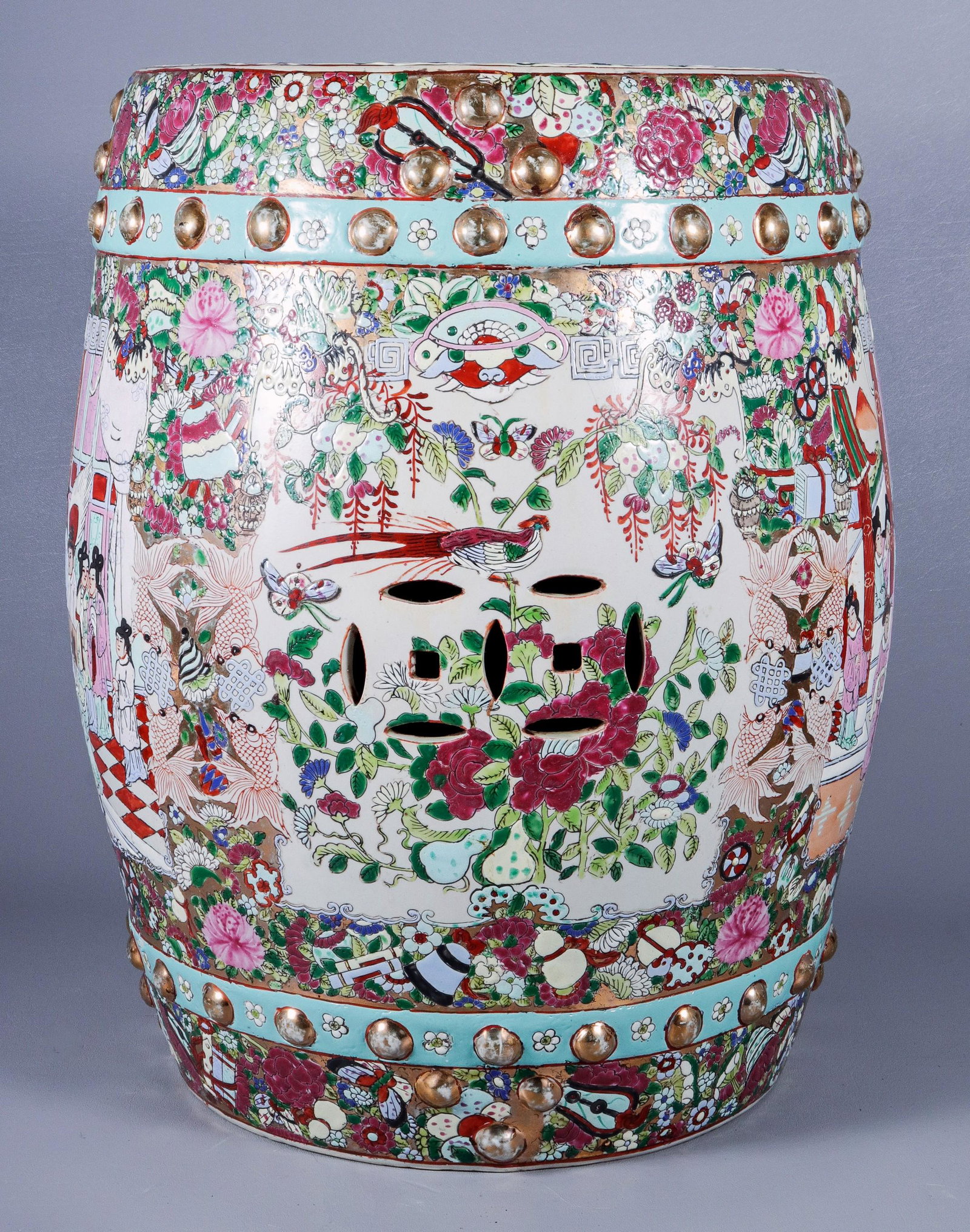 Chinese Rose Famille Pierced Garden Seat: Chinese Rose Famille pierced garden seat, highly decorated figural, bird, rose and butterfly decorated garden stool with pierced and parcel gilt stud decoration, 18-1/2" H x 12" dia