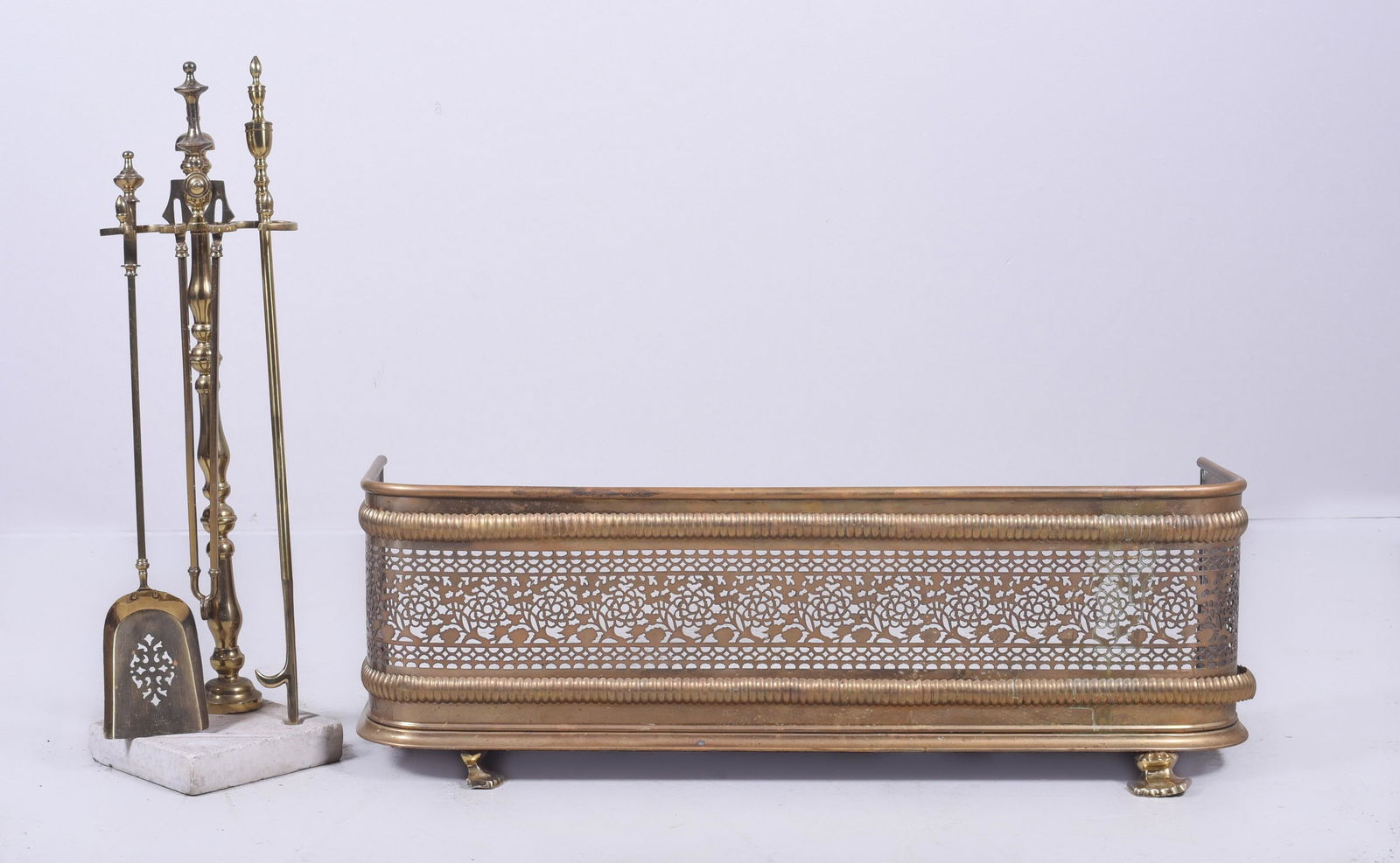 Brass fireplace tools on concrete base, fireplace (1 of 4)