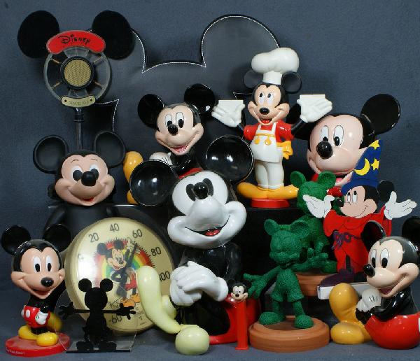 Large lot of Mickey Mouse items including thermome: Large lot of Mickey Mouse items including thermometer, topiary figures, Pez dispenser, porcelain bank, bobble head, and more