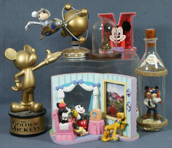 (6) Mickey Mouse items including Disney Cruise Lin: (6) Mickey Mouse items including Disney Cruise Line Golden Mickey, "Pirates Life for Me" figurine in bottle, picture frame, metal Sorcerer's Apprentice figure, Mickey in spaceship & Lucite "M", talles