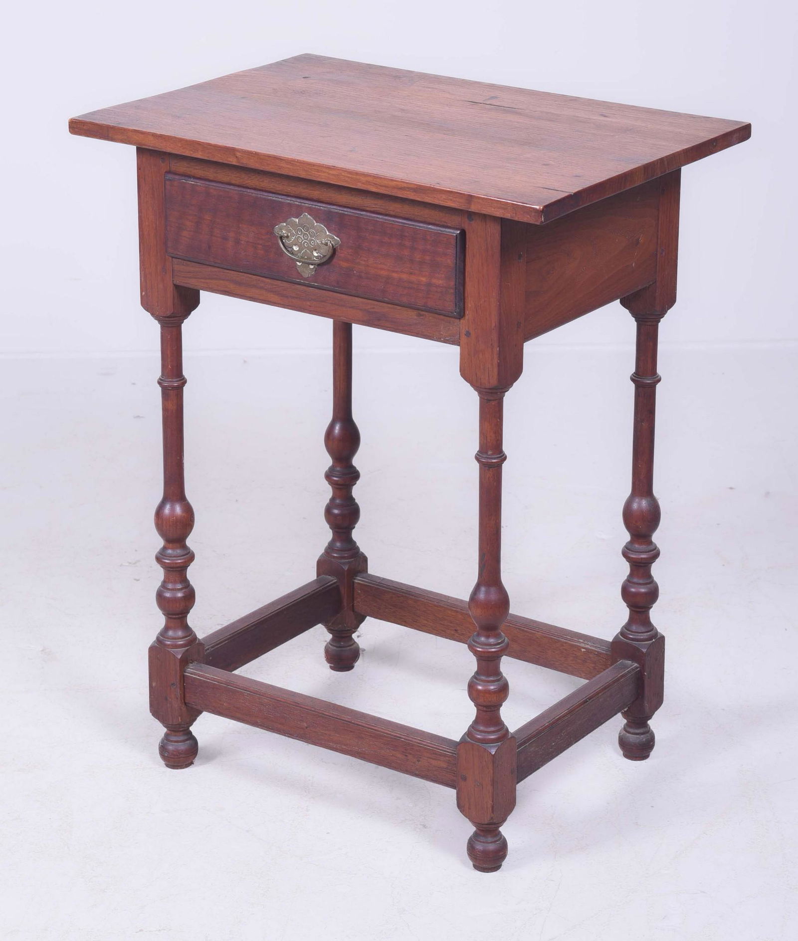 Walnut William & Mary Style 1 Drawer Tavern Table: Walnut William & Mary Style 1 Drawer Tavern Table, bench made, rectangular top over apron with a single lipped drawer, cotter key fastened QA style brass on drawer, baluster and ring turned legs joine