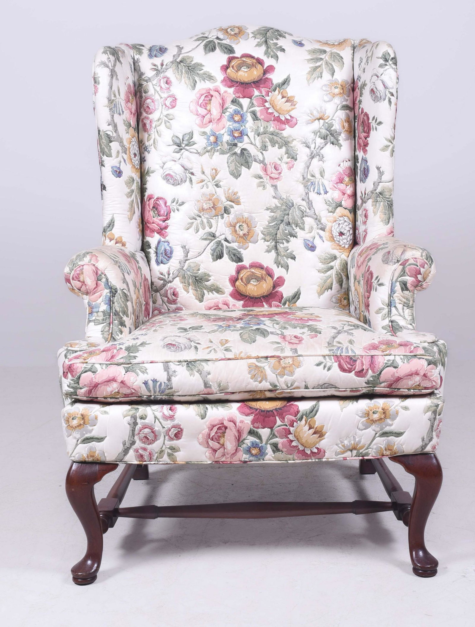 Hickory Chair Co Queen Anne style wing chair: Hickory Chair Co Queen Anne style wing chair, floral quilt upholstery, mahogany stretcher, 46"h x 32"w x 30"d, soiling to upholstery