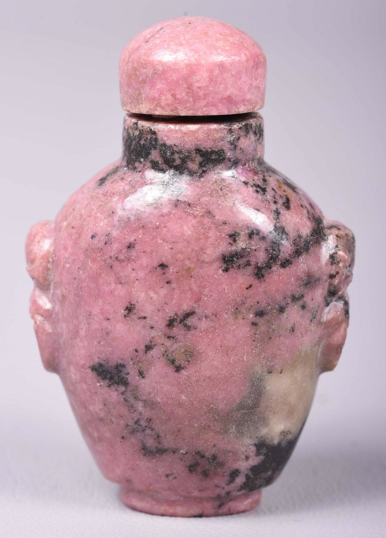 Chinese Carved Stone Snuff Bottle: Chinese snuff bottle, carved rhodonite, urn with ring handles, stopper & spoon intact, 2-1/2" h