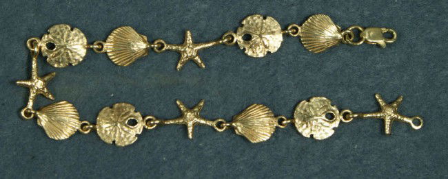 Unmarked YG anklet with sea star and shell design,: Unmarked YG anklet with sea star and shell design, 3.8 dwt, tests w/acid @ 14K
