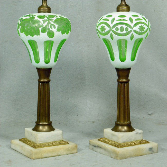 Pr cased glass white cut to light green kerosene l: Pr cased glass white cut to light green kerosene lamps with brass & marble bases, 14 3/4" tall to top of burner fitter, white silk shades, 27" tall overall