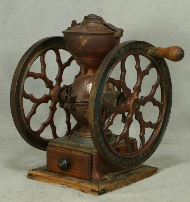 Cast iron Charles Parker Co, Makers No 3000 coffee: Cast iron Charles Parker Co, Makers No 3000 coffee grinder, original paint needs to be cleaned, drawer, and stencils, some wear, 14 1/2" tall