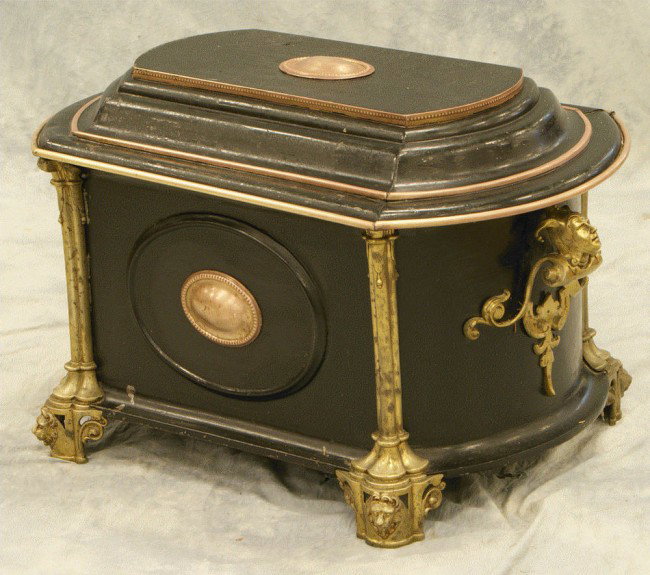 Tole coal scuttle with brass jester head animals a: Tole coal scuttle with brass jester head animals and animal head feet, galvanized tin liner, 32" l, 19" d & w