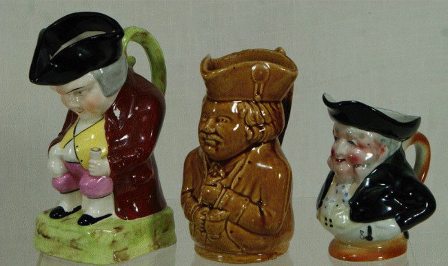 (3) toby jugs, 6" Rockingham type, 7" Staffordshi: (3) toby jugs, 6" Rockingham type, 7" Staffordshire, 5" J Bull