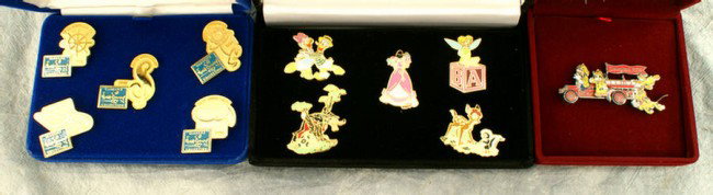 Boxed collectible pins, set of five classics Walt D: Boxed collectible pins, set of five classics Walt Disney Collection 5th Anniversary, set of five classics Walt Disney Collection, and one Disneyland 2000 with a Neverland card with compass pin