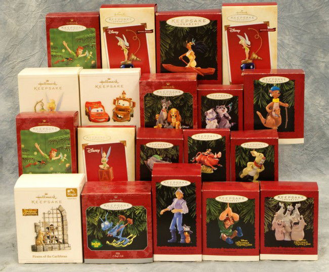 (40) Hallmark keepsake ornaments including Peter P: (40) Hallmark keepsake ornaments including Peter Pan, 101 Dalmations, Toy Story, Lady and the Tramp, Bug's Life, Cars, Pirates in the Caraibbean, Pocahantas, Hercules, Hunchback of Notre Dame, and Win