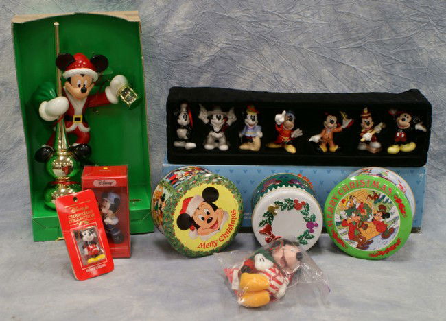 Mickey Mouse Christmas lot including Mickey Mouse: Mickey Mouse Christmas lot including Mickey Mouse Tree Topper, 2 tins, Through the Years Set, 7 bisque figures, 4 Disney ornaments