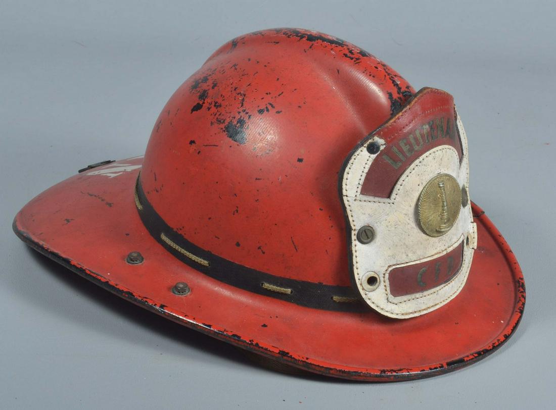 Mid Century Lieutenant's Fire Hat: Mid-Century lieutenants fire hat, CFD Chicago Fire Dept. with leather badge at front reading "Lieutenant CFD" with fire bugle, leather interior and chin strap in tact, 14-1/2"L