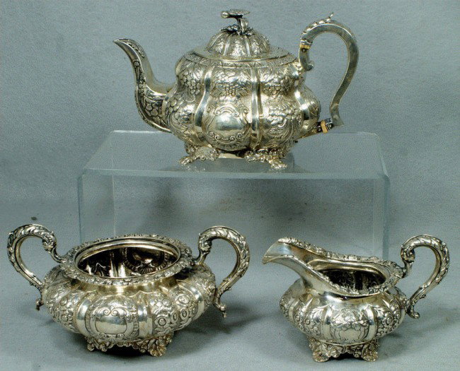 3 pc Irish Georgian sterling silver floral repousse: 3 pc Irish Georgian sterling silver floral repousse teaset, teapot Dublin, 1827, by Charles Marsh, creamer and sugar, Dublin, 1835 by John John Le Bas, 54.6 TO