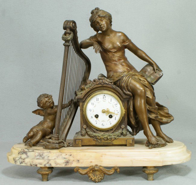 Figural mounted & marble French mantle clock, lady: Figural mounted & marble French mantle clock, lady seated with cherub and harp, patinated white metal, artist signed, 18 1/4" tall, 20 1/2" long