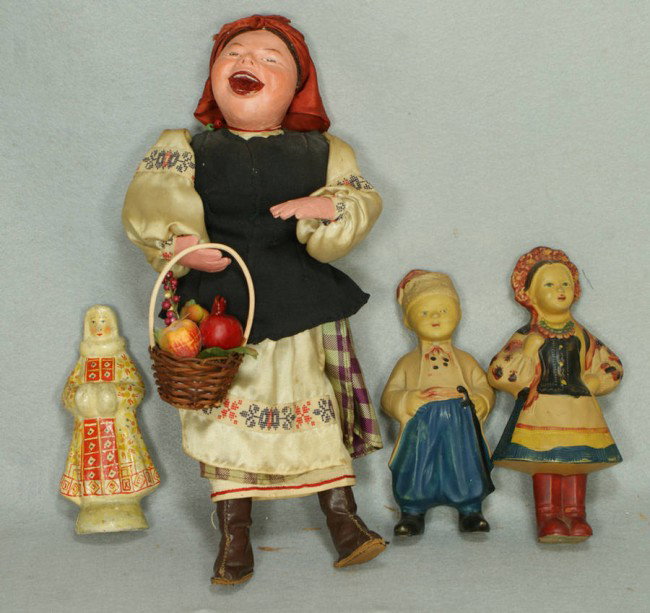 9 Russian dolls, 5 celluloid heads, 2 soft rubber,: 9 Russian dolls, 5 celluloid heads, 2 soft rubber, 2 paper mache, tallest 16", early Soviet era