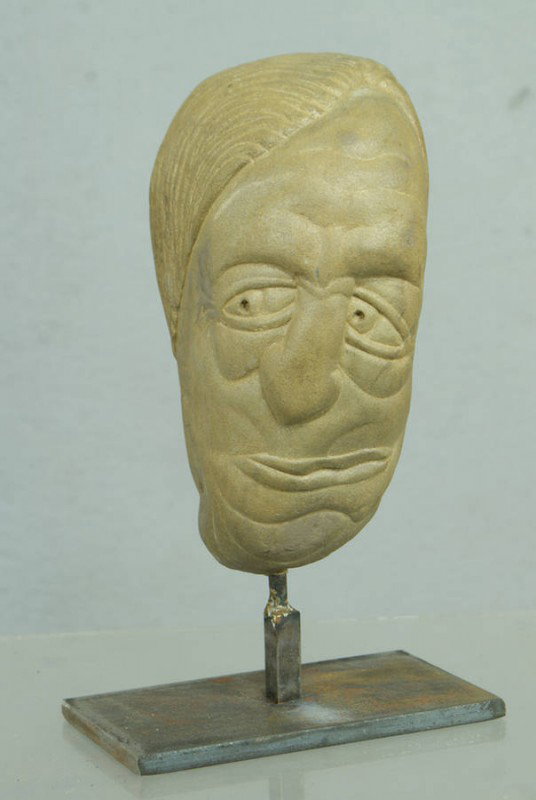 David George Marshall, American, NY, b 1936, (3) c: David George Marshall, American, NY, b 1936, (3) carved creekstone heads, tallest 7 1/2" high on iron stands. Ref: American Folk Art of the 20th Century, Johnson & Ketchum, 1983, p 188.