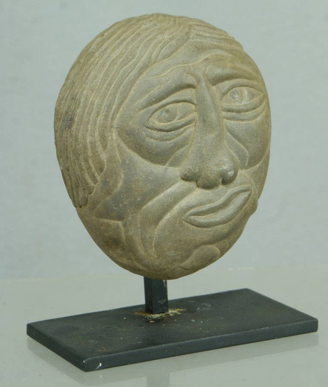 David George Marshall, American, NY, b 1936, (3) c: David George Marshall, American, NY, b 1936, (3) carved creekstone heads, 6 1/2" high on iron stands. Ref: American Folk Art of the 20th Century, Johnson & Ketchum, 1983, p 188.