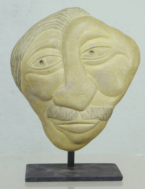 David George Marshall, American, NY, b 1936, (2) c: David George Marshall, American, NY, b 1936, (2) carved creekstone heads, tallest 7 1/2" high on iron stands. Ref: American Folk Art of the 20th Century, Johnson & Ketchum, 1983, p 188.
