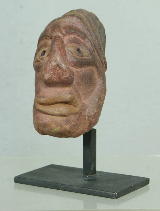 David George Marshall, American, NY, b 1936, (4) c: David George Marshall, American, NY, b 1936, (4) carved and painted creekstone heads, tallest 6 3/4" high on iron stands. Ref: American Folk Art of the 20th Century, Johnson & Ketchum, 1983, p 188.