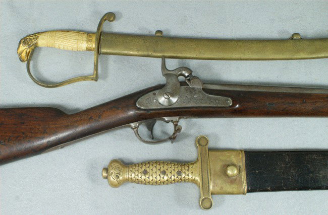Model 1851 US Springfield percussion cadet musket,: Model 1851 US Springfield percussion cadet musket, 57 caliber, 40" barrel, The lock plate is marked: "SPRING / FIELD / 1852" vertically behind the hammer and is stamped with the eagle and shield above
