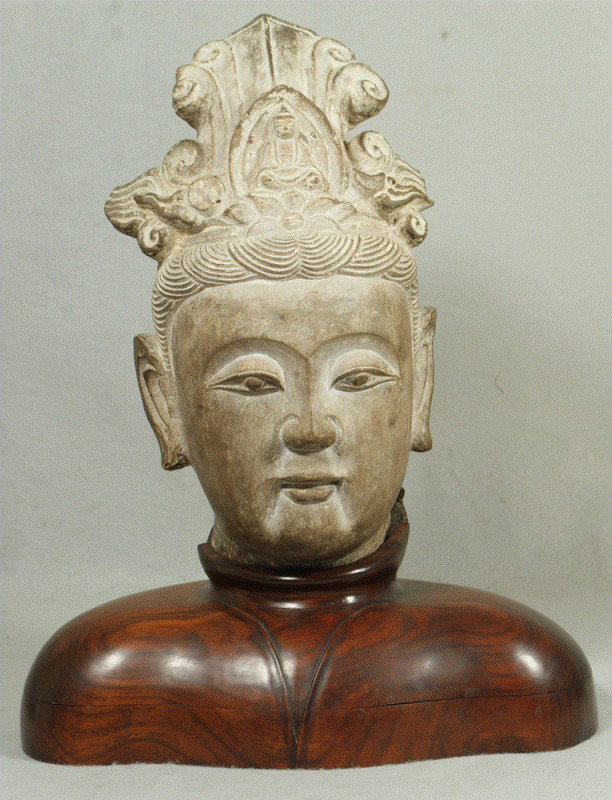 Carved stone Buddha head on later wood base, the h: Carved stone Buddha head on later wood base, the head about 14" tall