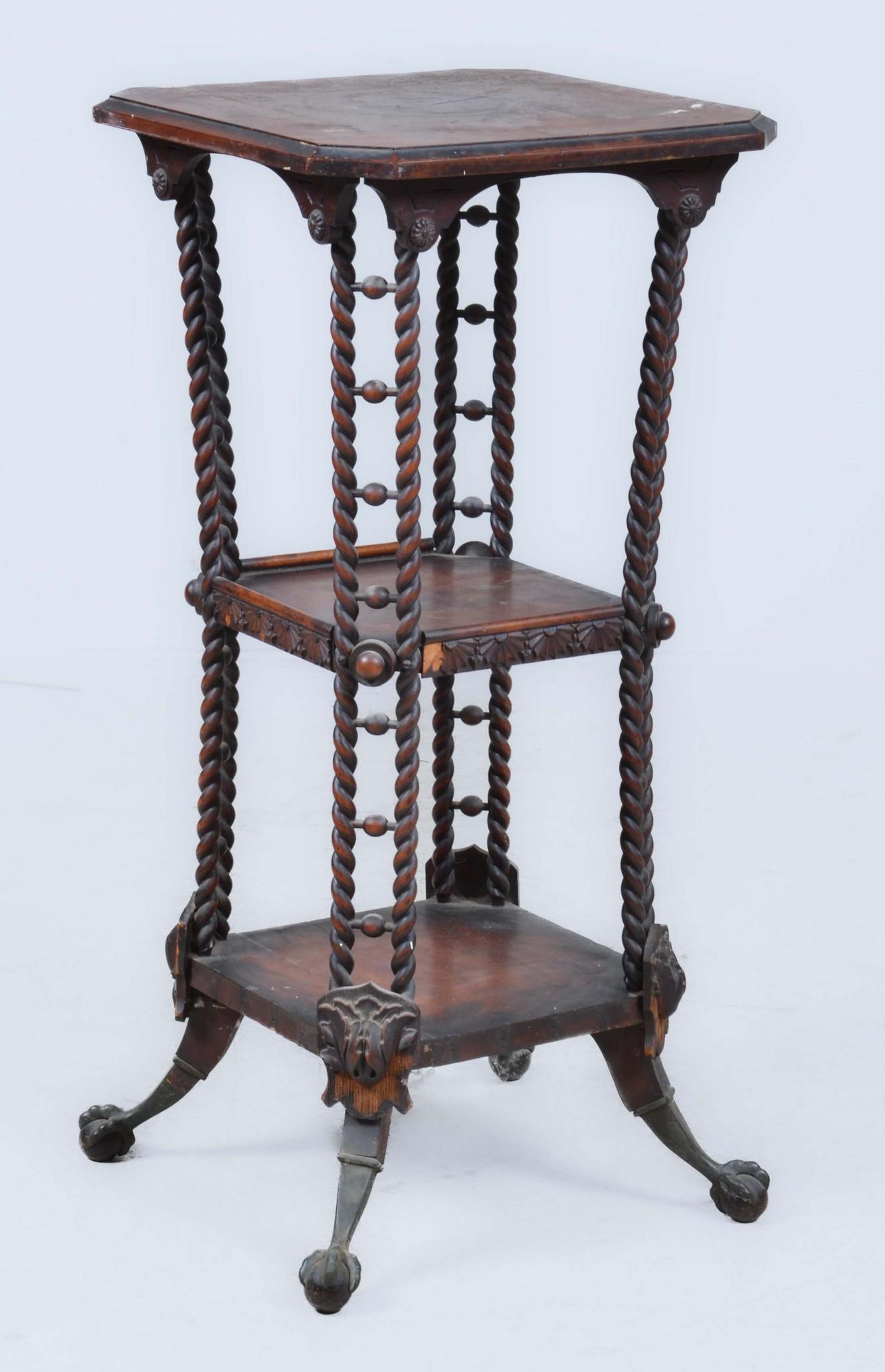 An Eastlake carved cherry three tier pedestal stand (1 of 7)