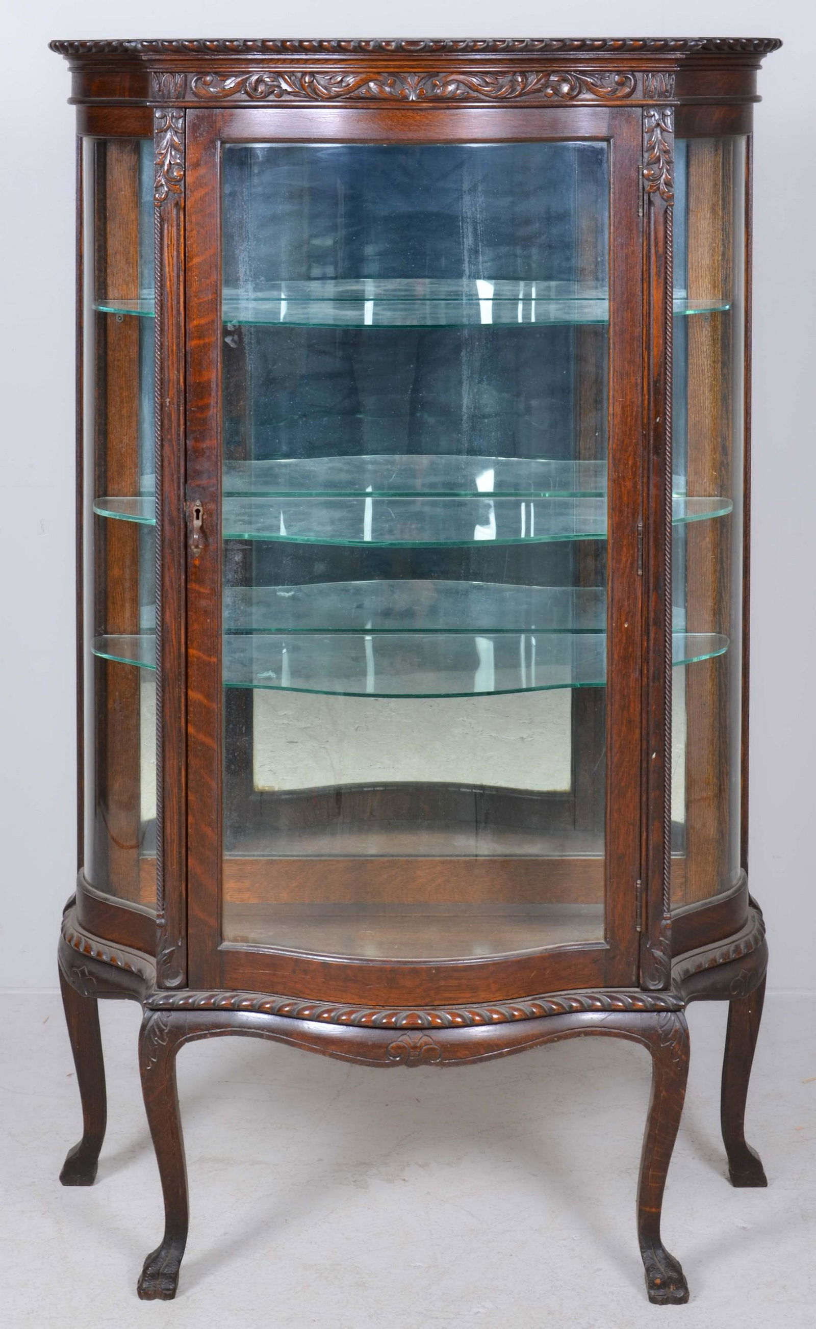 An American Rococo style carved oak display case (1 of 4)