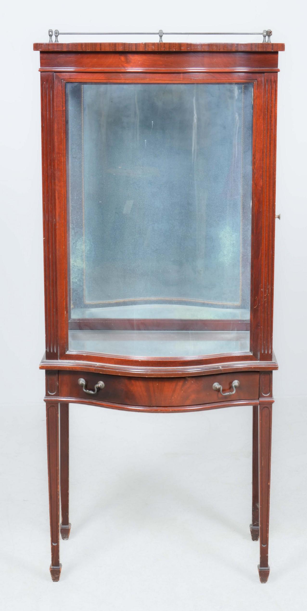 George III style mahogany serpentine cabinet: George III style mahogany serpentine cabinet on stand