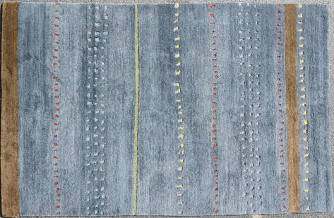 5'7" X 8'7" Tibet Modern Design Rug: 5'7" X 8'7" Tibet Modern Design Rug, fading, please see photos for any specific condition concerns.