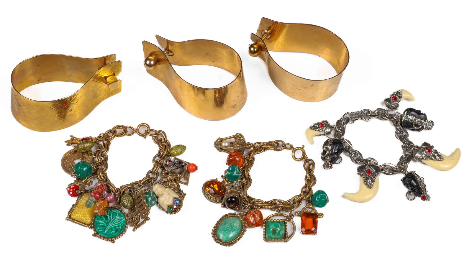 (6) Vintage Costume Bracelets: (6) Vintage costume bracelets to include (3) gold tone Volupte cuff form bracelets with side 'cufflink' closure, pair + 1, Selro Selini faux bone and carved figure charm bracelet and (2) Selro unmarke