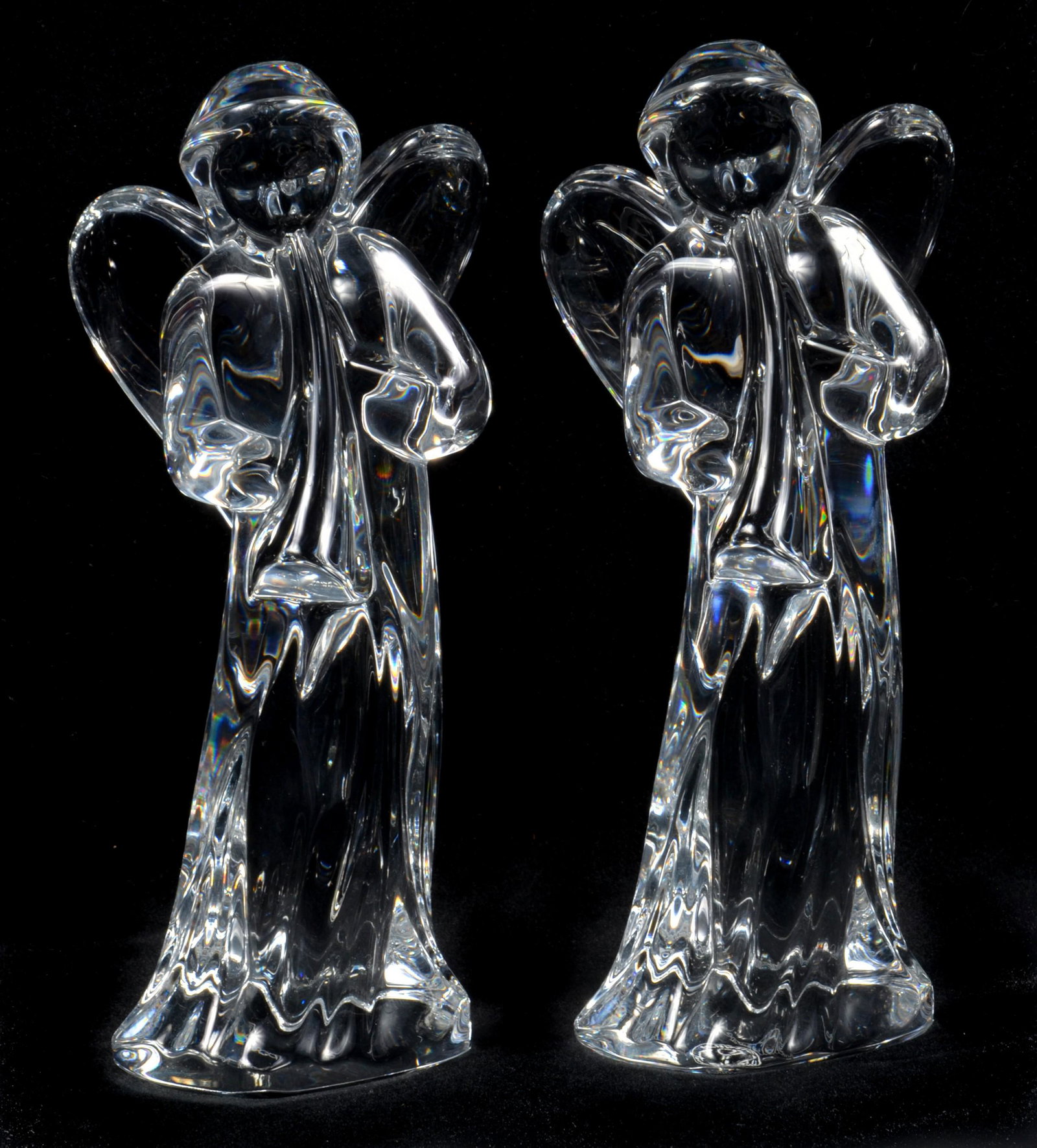 Baccarat Crystal Angel Pair: Baccarat crystal angel pair, 6-1/4" H, No chips, scratches or losses to bodies, very good condition, faint scratch to underside of 1