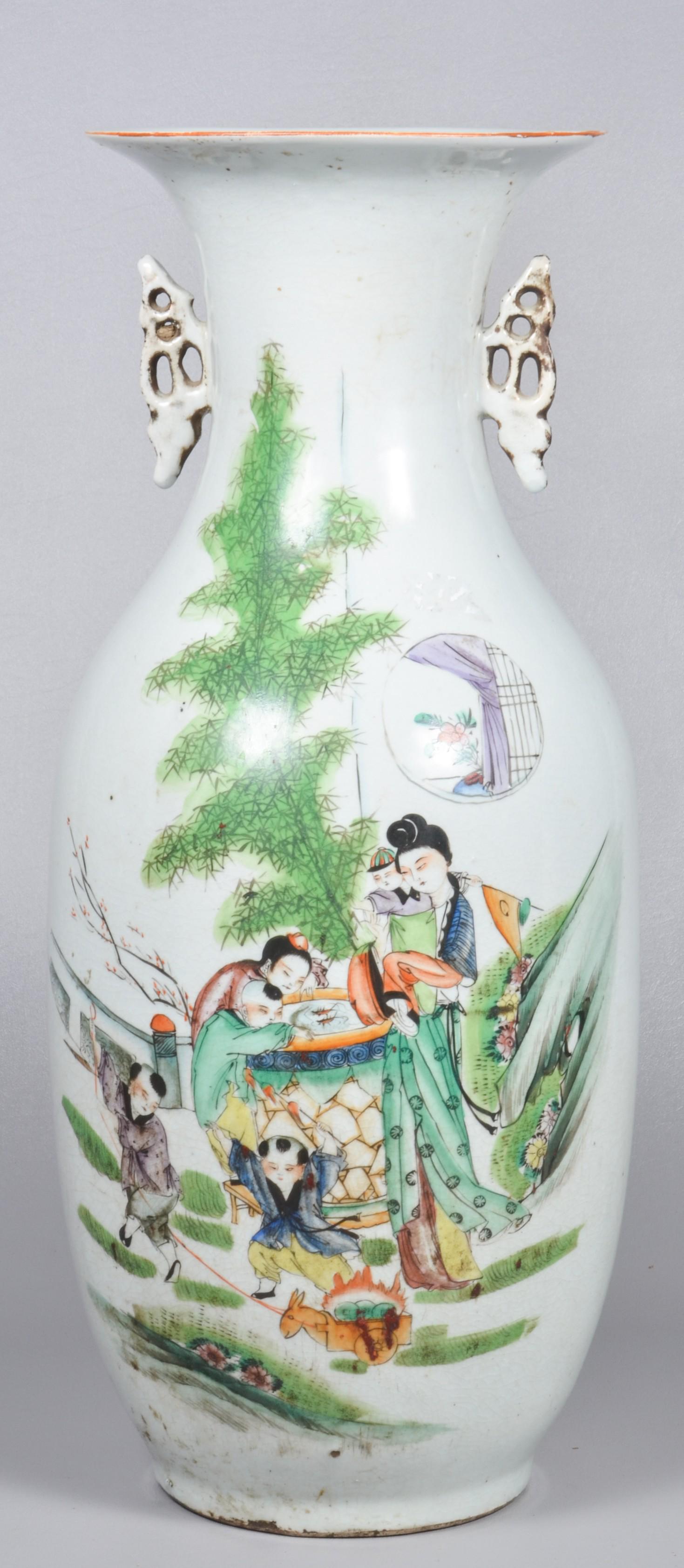 Chinese Porcelain Vase: Chinese porcelain vase, figures in landscape, calligraphy to back, butterfly handles, drilled for lamp, 22" h