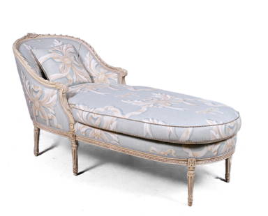 Lewis Mittman Louis XVI style carved chaise lounge: Lewis Mittman Louis XVI style carved chaise lounge, carved cream frame, turquoise upholstery with cream and white bow decoration, 33"h x 62"w x 27"d